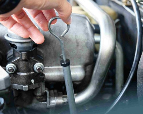 image-of-a-car-mechanic-checking-the-oil-engine-le-2025-03-10-09-25-48-utc_11zon